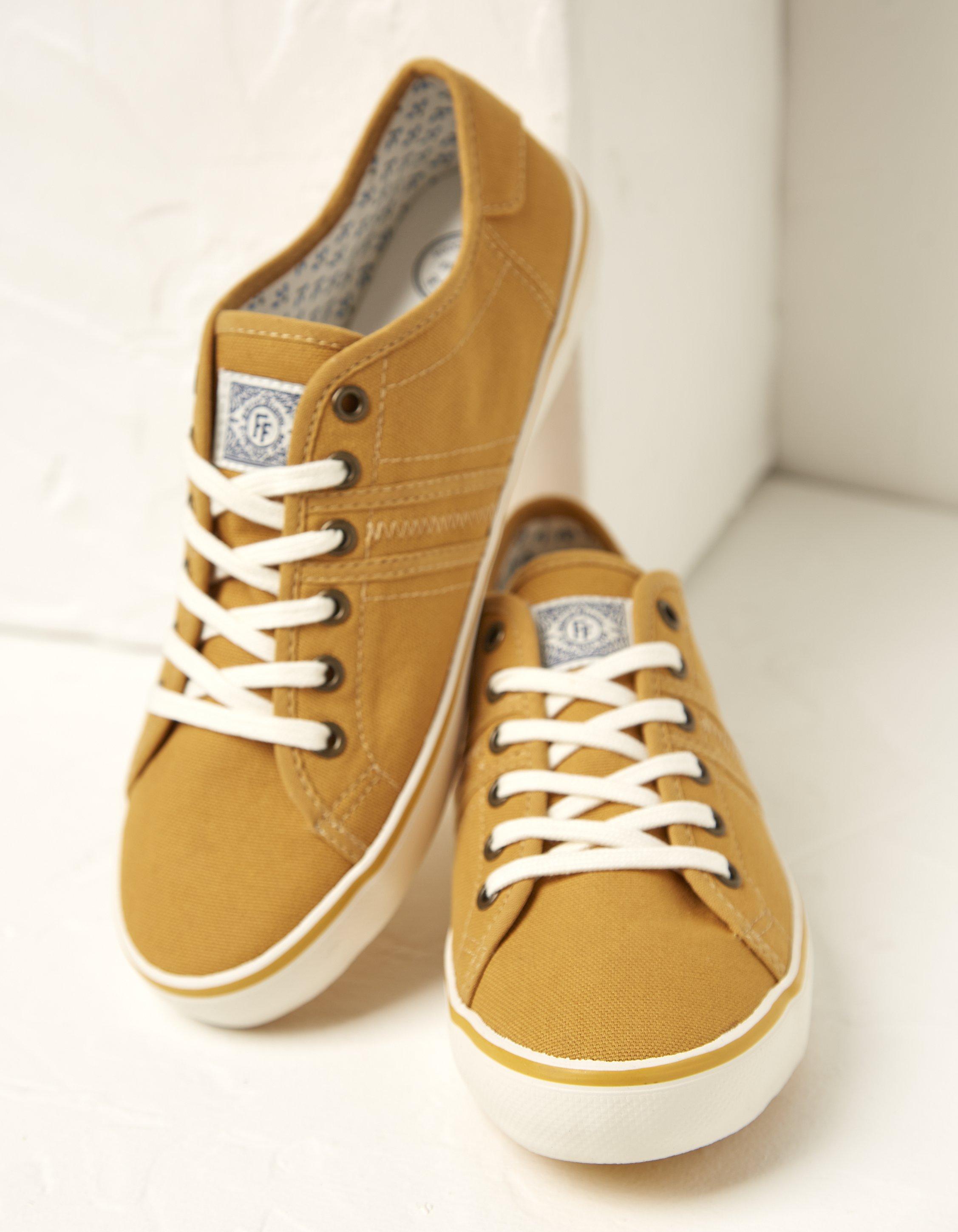 Mustard hotsell womens trainers